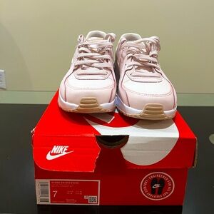 Women’s Nike AirMax sneaker in blush pink color